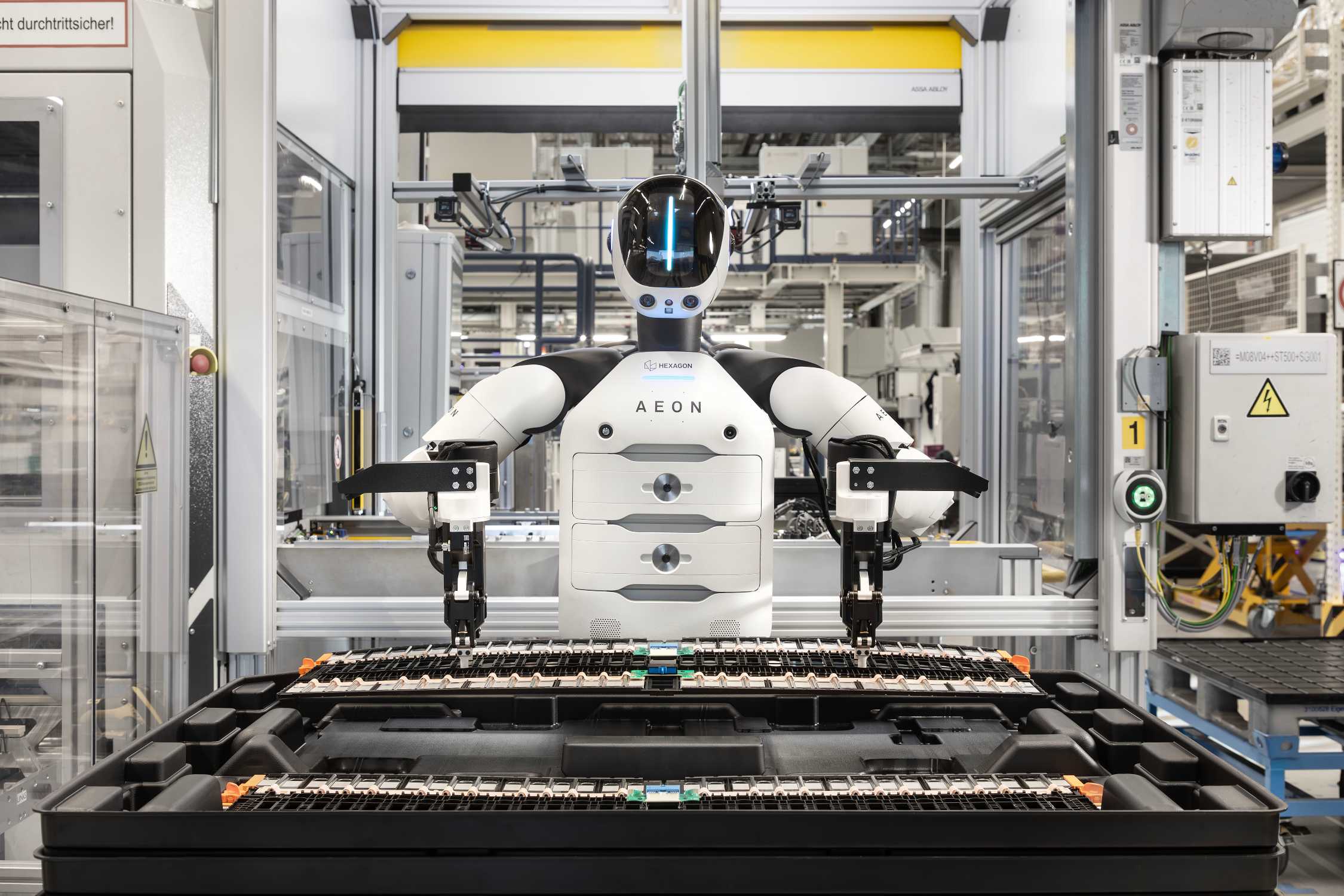 Hexagon Robotics' AEON humanoid robot at BMW Group Plant Leipzig, deployed for high-voltage battery and component assembly